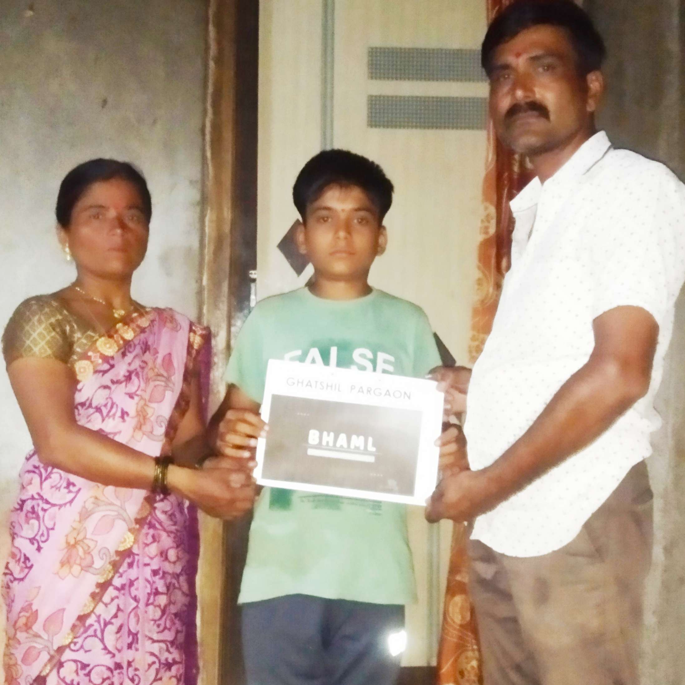 Young student receiving BHAML certificate from adults