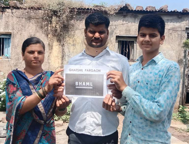 BHAML family outreach program - Family receiving BHAML certificate in rural community