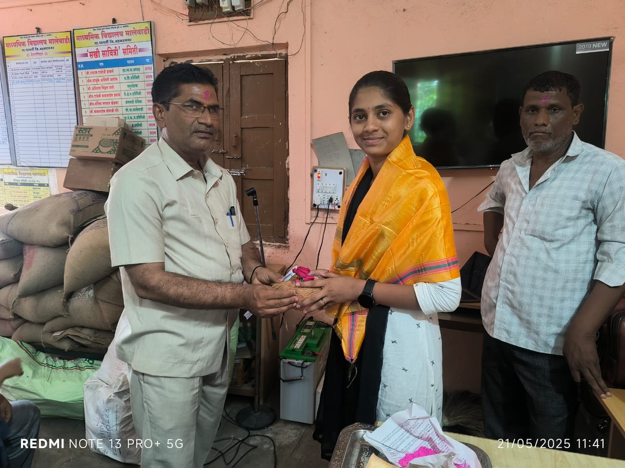 Official recognition ceremony with student receiving award